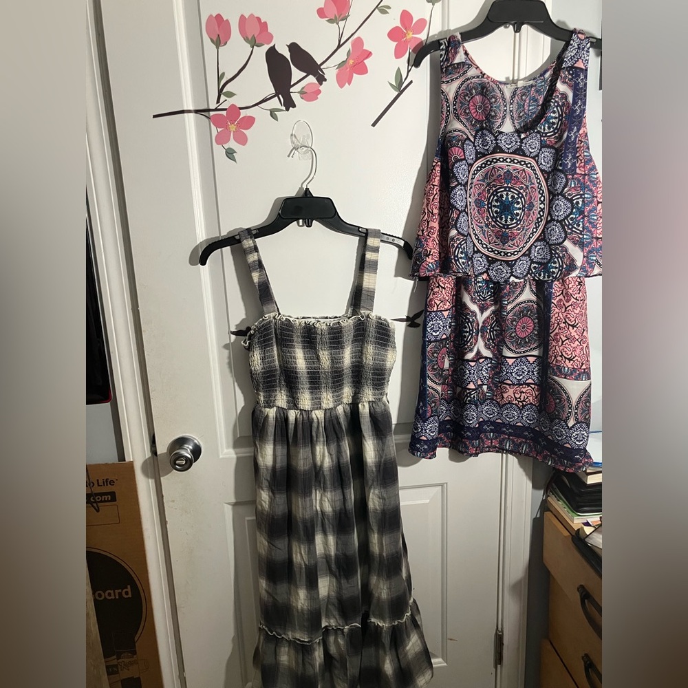 Two dresses for girls size medium in good condition